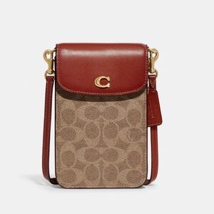 Coach Phone Crossbody In Signature Canvas in Tan Rust
